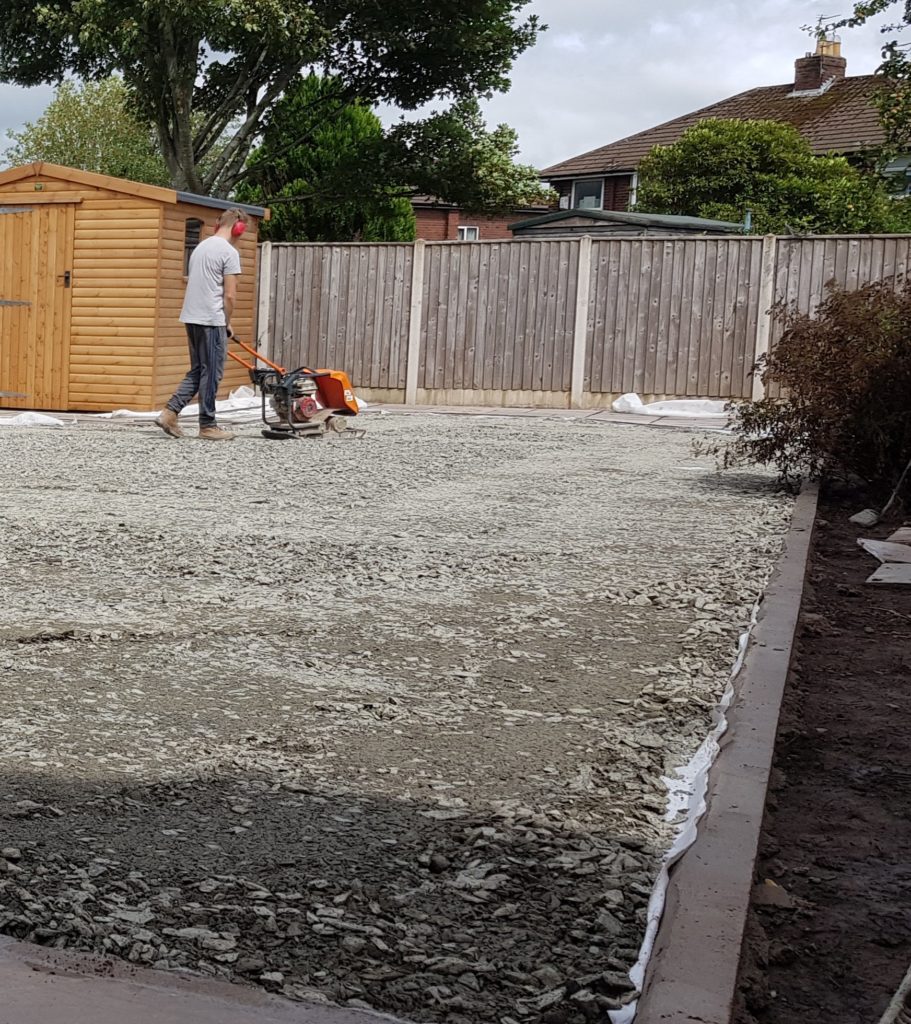 Subbase being compacted