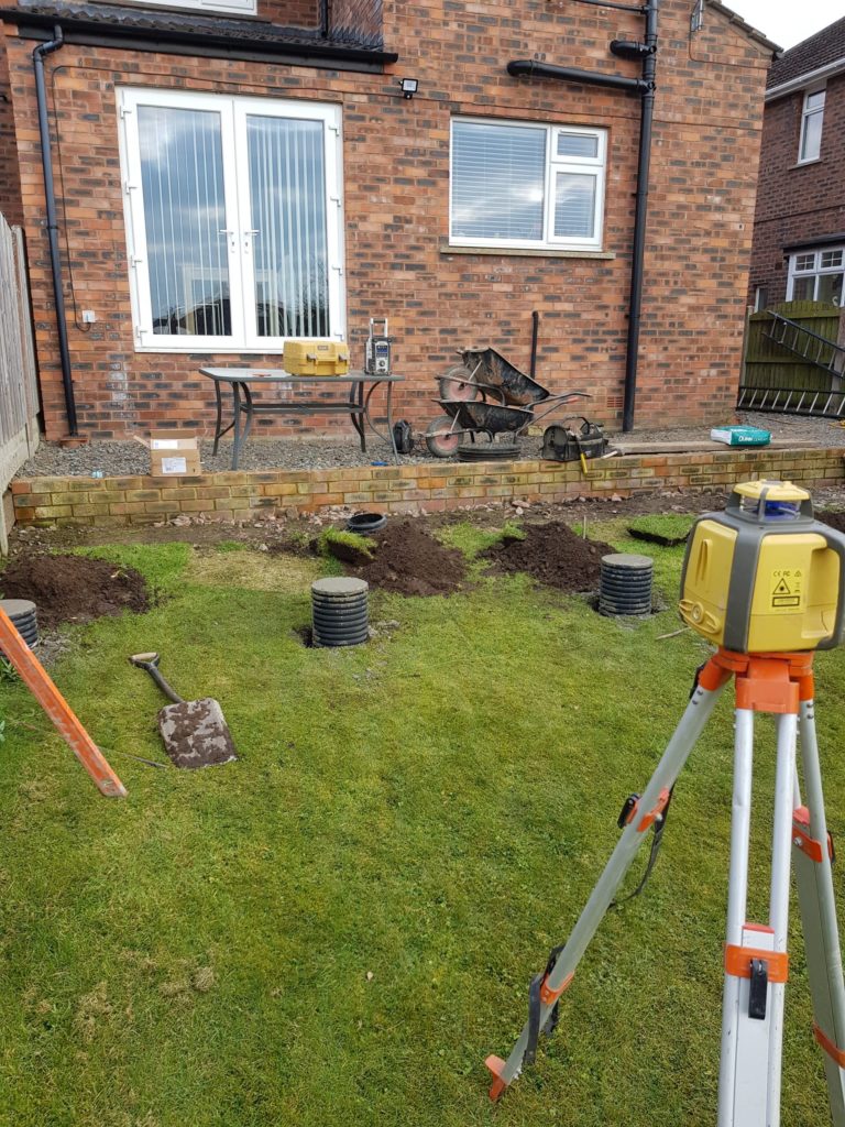 laser level used to set footings for decking Carlisle