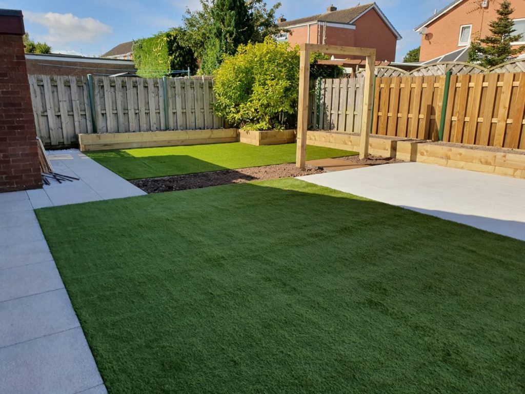 Two artificial lawns and porcelain patio