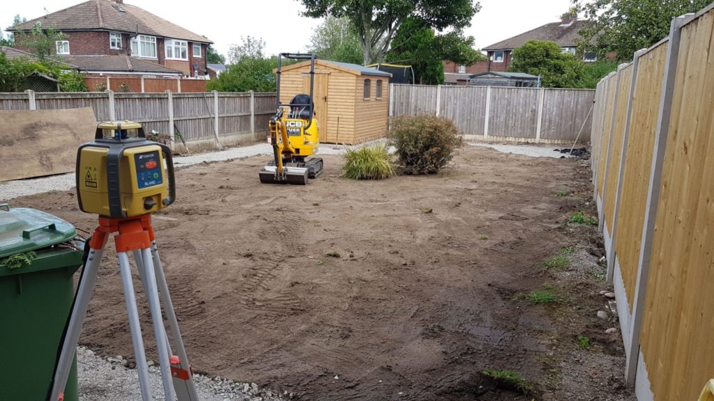 micro digger removing turf