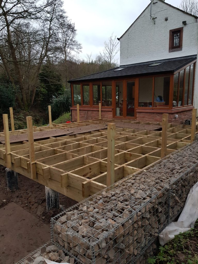 newel posts installed on decking frame 