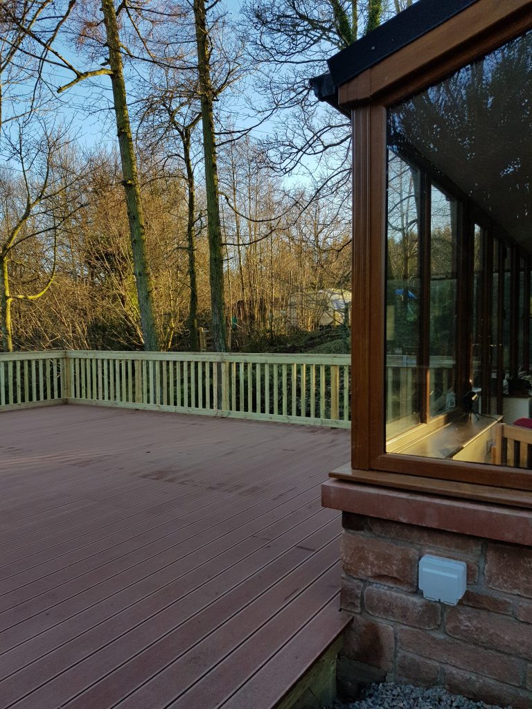 deck built against  a wall 