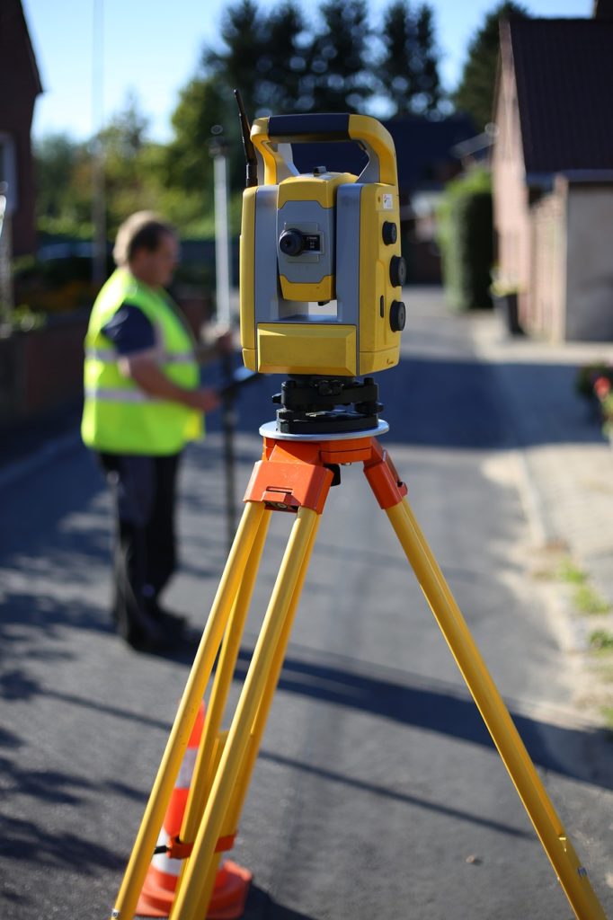 theodolite surveying a garden