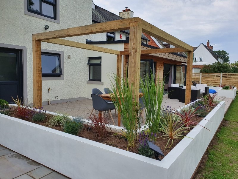 composite deck, white planters and pergola Cumbria